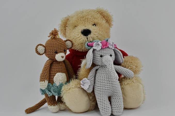 Muñecas y peluches